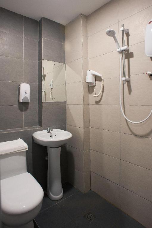 Econtel Queensbay Sungai Dua Bukit Esterno foto