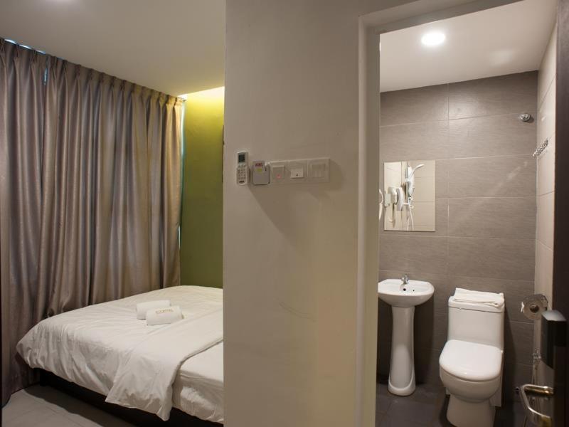 Econtel Queensbay Sungai Dua Bukit Esterno foto